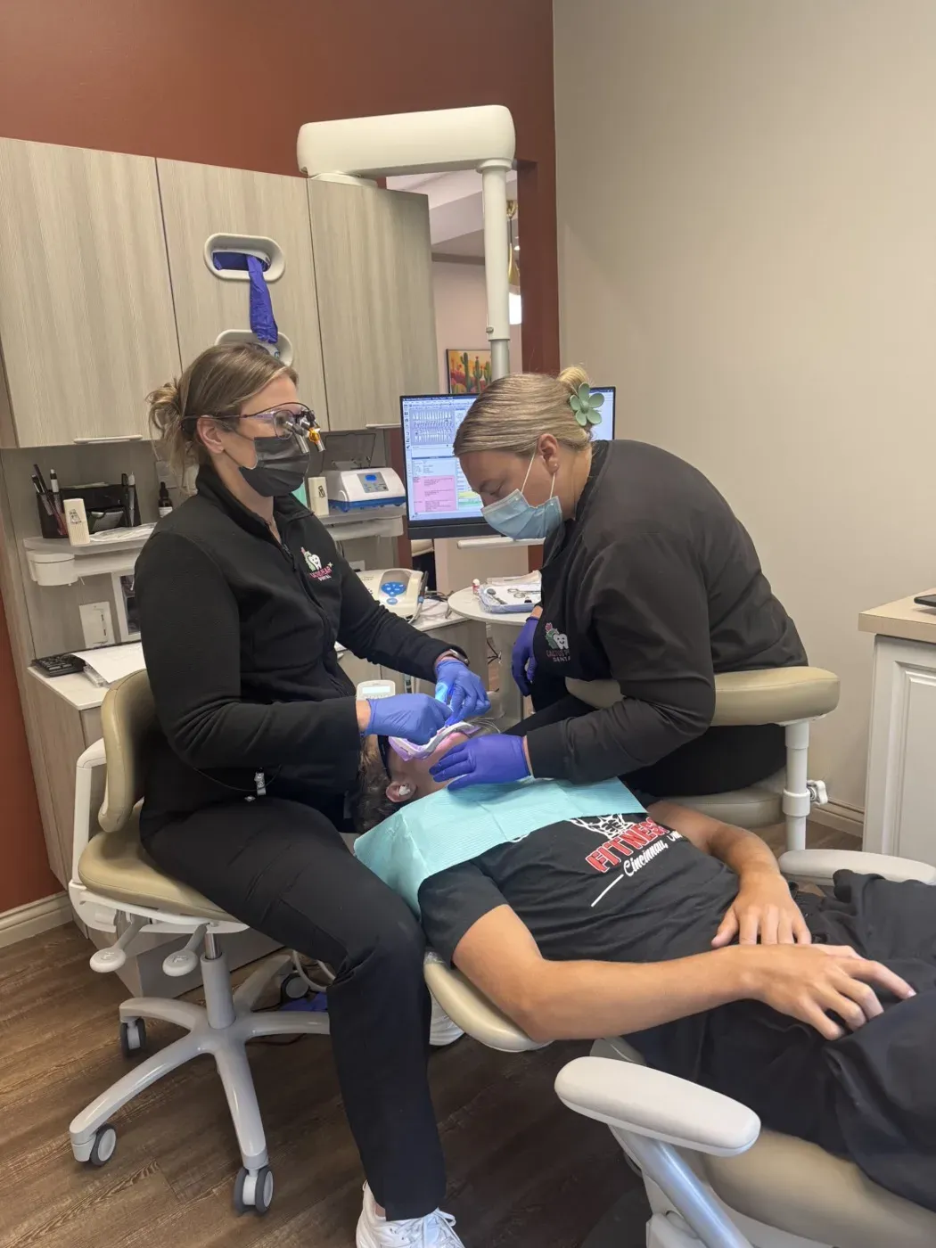 Dr. Oberlander and a team member working together on a patient